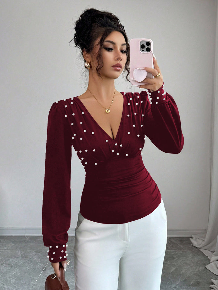 Damen elegantes Blusenshirt mit V-Ausschnitt und Verzierung Drune