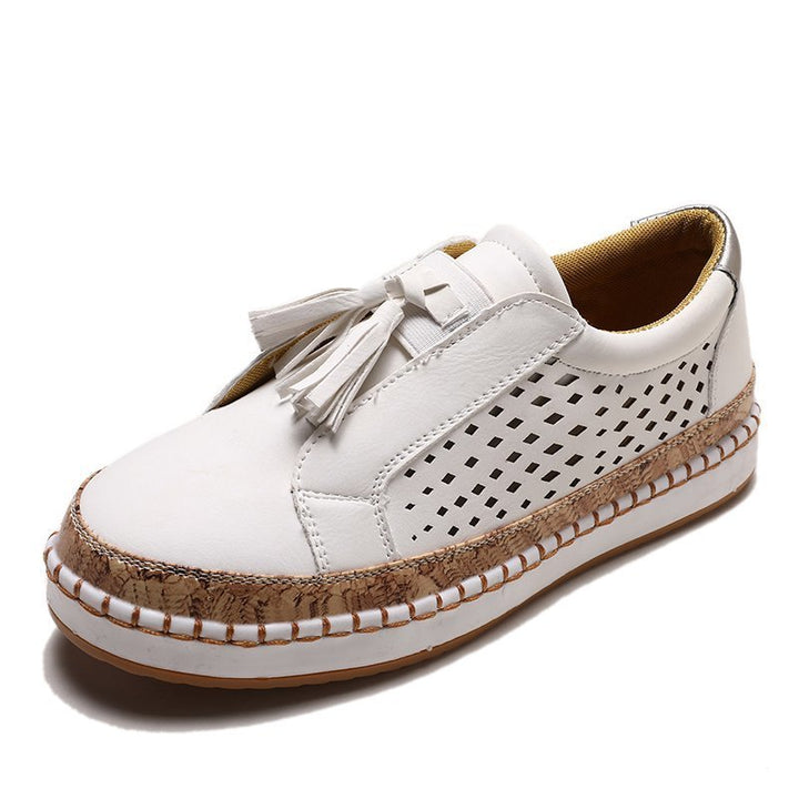Damen nan perforierter Slip-On Sneaker mit Quasten, Kork-Plateau und dekorativer Handnaht Drune