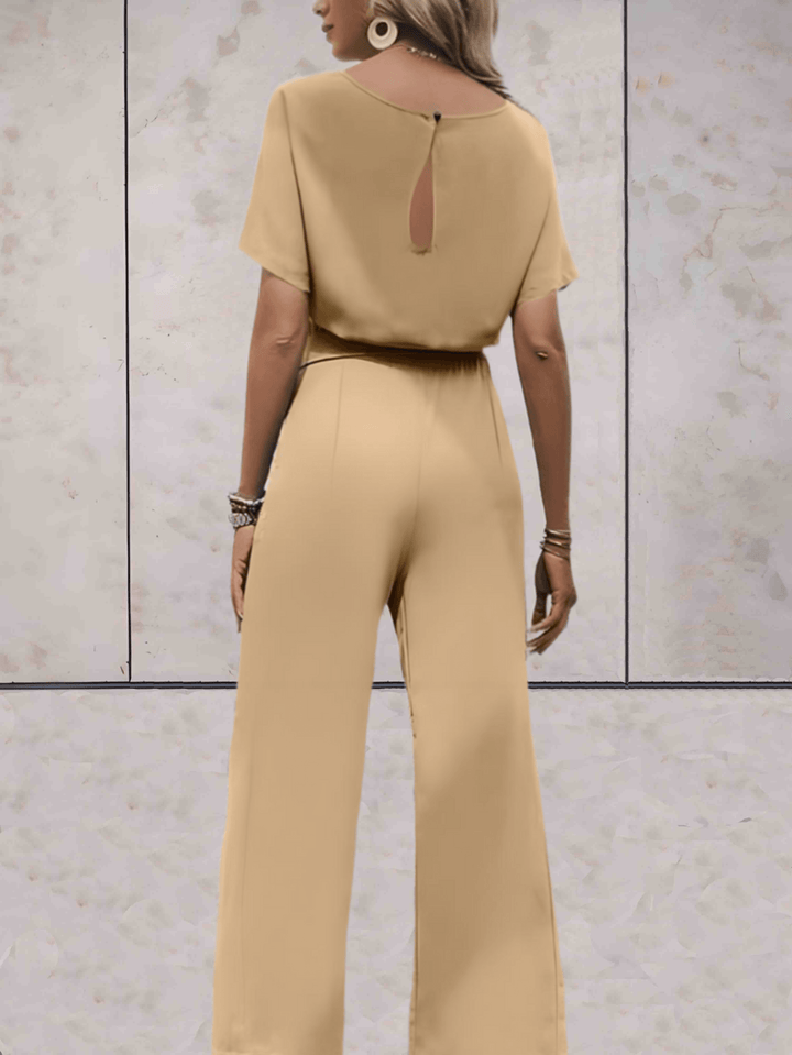 Drune - Jumpsuit mit Gürtel und kurzen Ärmeln