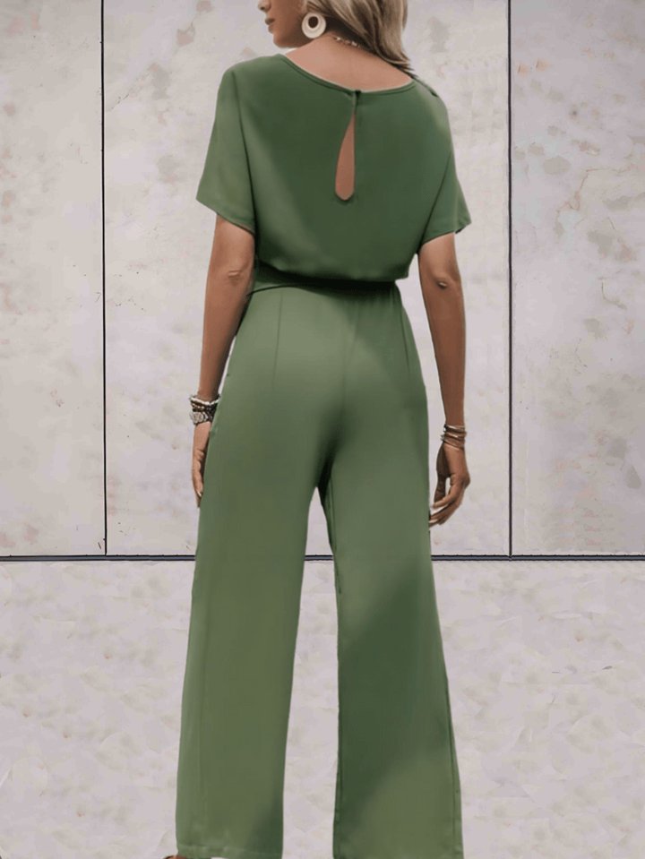 Drune - Jumpsuit mit Gürtel und kurzen Ärmeln