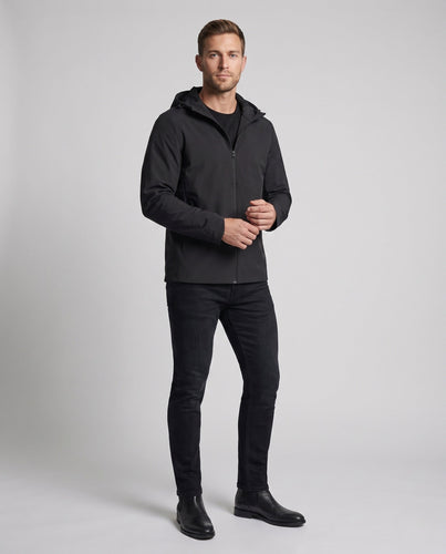Herren nan minimalistische Reise-Hardshelljacke mit verstaubarer Kapuze atmungsaktivem Stretch und verdeckten Reißverschlusstaschen Drune