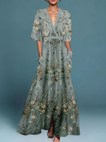 Drune | Maxikleid mit floralen Prints in fließender Form