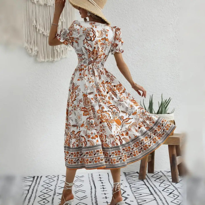 Drune | Elegante Orange Blumenkleid
