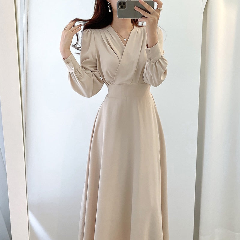 Drune | Elegantes Kleid mit Puffärmeln und V-Ausschnitt In A-Linie
