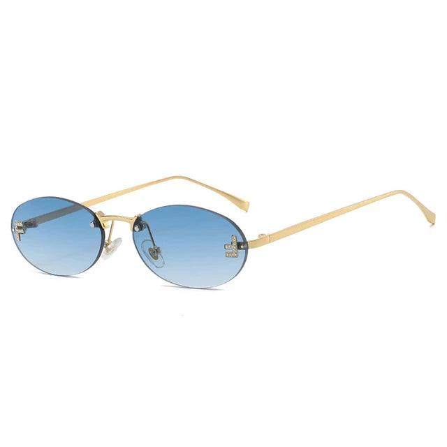 Drune | Ovale Sonnenbrille Mit Goldenen Akzenten Und Subtilen Steinen