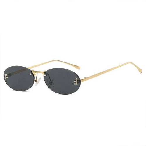 Drune | Ovale Sonnenbrille Mit Goldenen Akzenten Und Subtilen Steinen