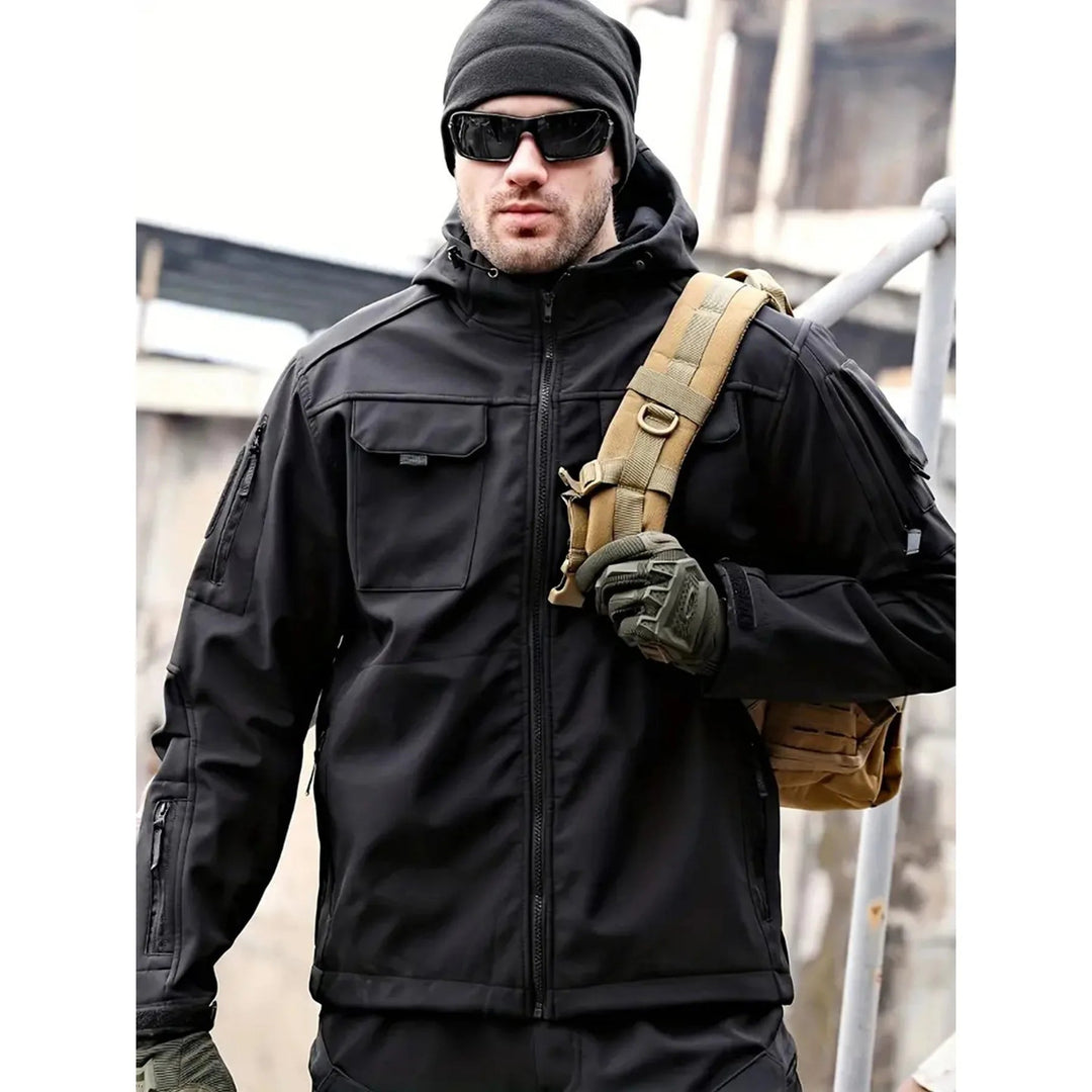 Drune | Wasserabweisende Softshelljacke mit Kapuze