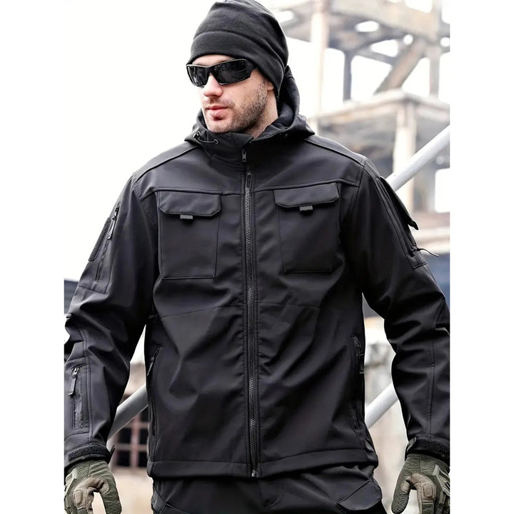 Drune | Wasserabweisende Softshelljacke mit Kapuze