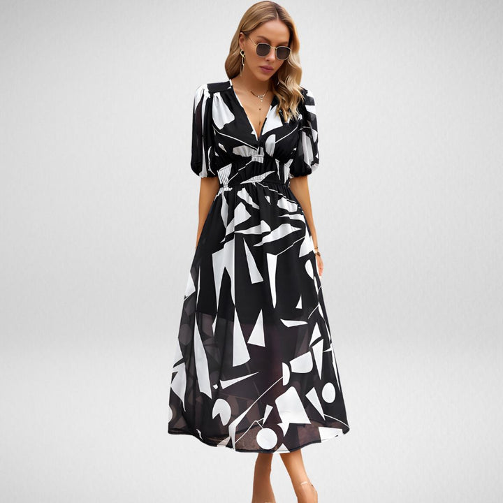 Drune | Abstrakt bedrucktes Maxikleid mit Puffärmeln