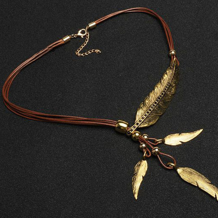 Drune | Goldene Feder Halskette Im Boho Stil