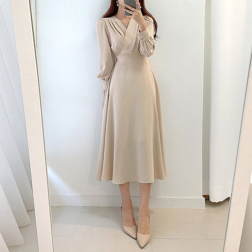 Drune | Elegantes Kleid mit Puffärmeln und V-Ausschnitt In A-Linie
