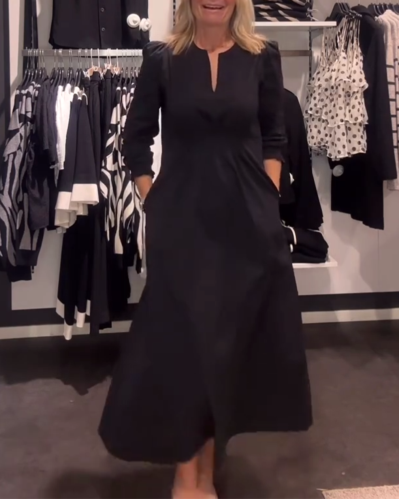 Drune | Linien Kleid mit Puffärmeln und Tailliertem Schnitt