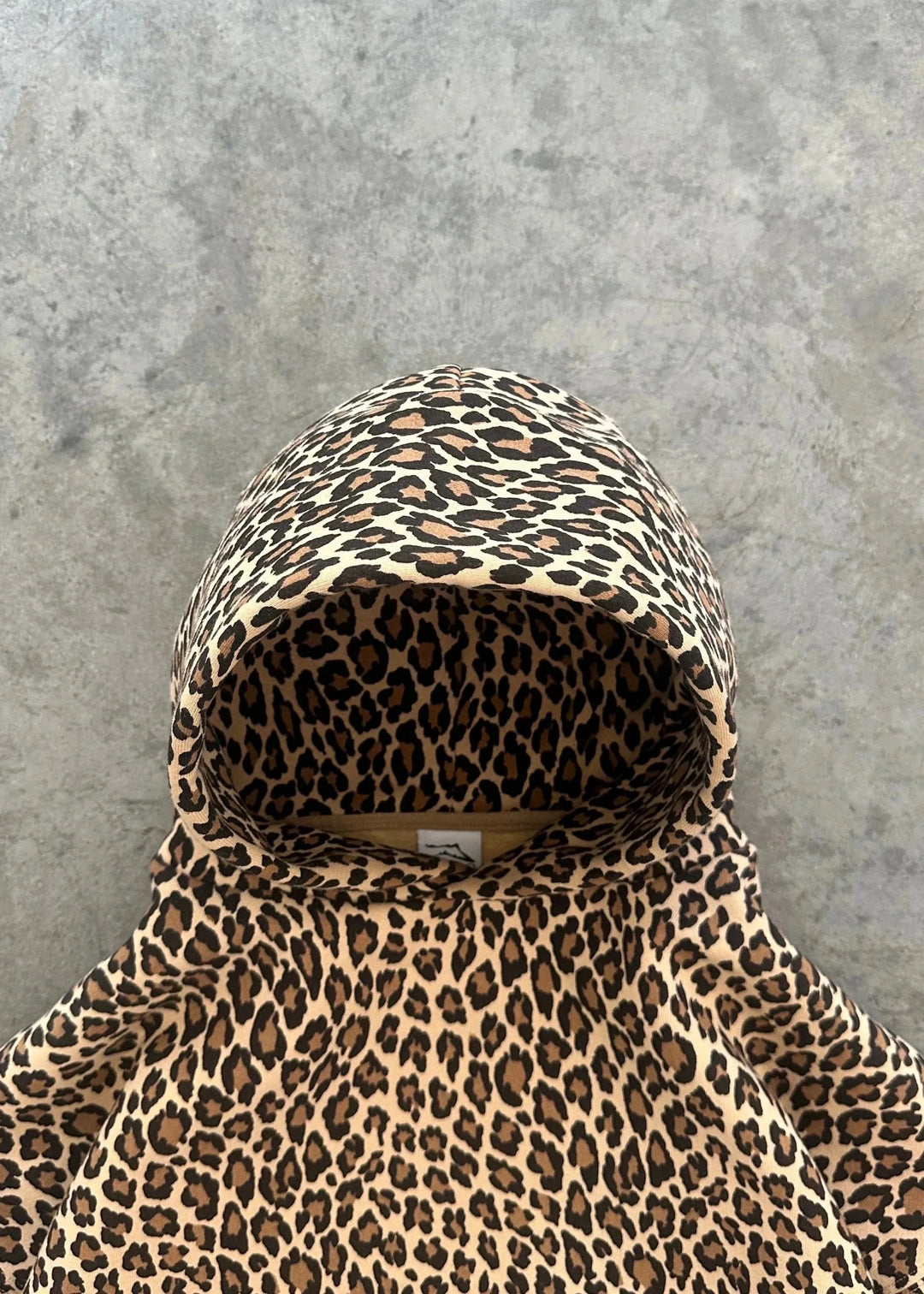 Drune | Oversized & Gemütlicher Leoparden-Poncho mit Kapuze Statement Piece