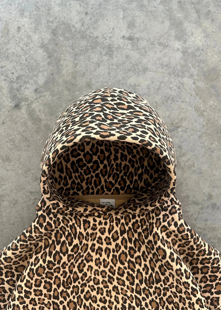 Drune | Oversized & Gemütlicher Leoparden-Poncho mit Kapuze Statement Piece