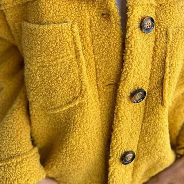 Drune | Oversized-Jacke aus gelbem Bouclé-Lammfell, warm und gewagt