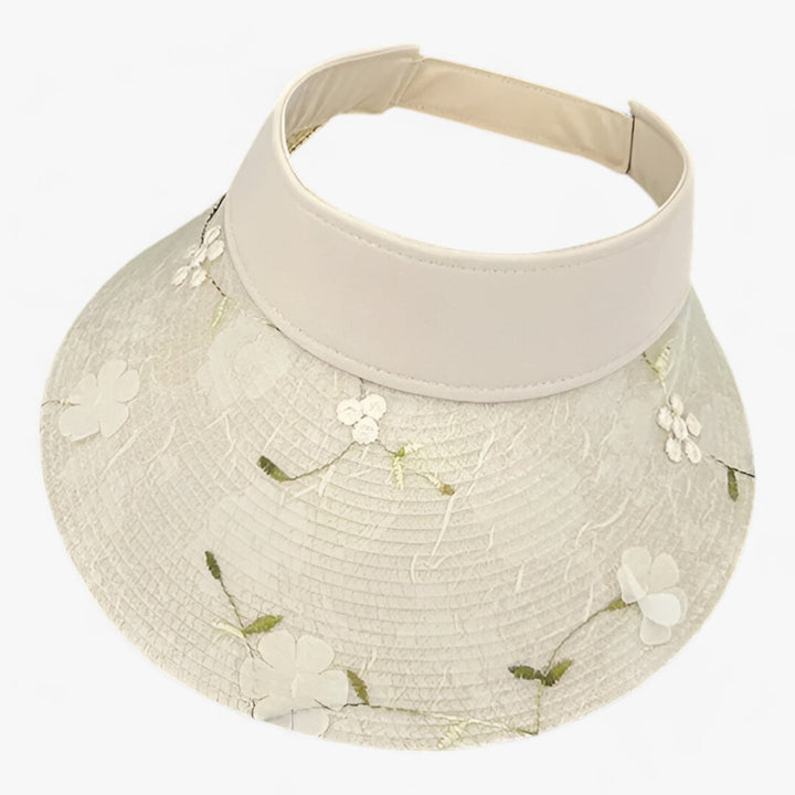 Stilvoller Strohhut - Sonnenschutz & Blumenakzent