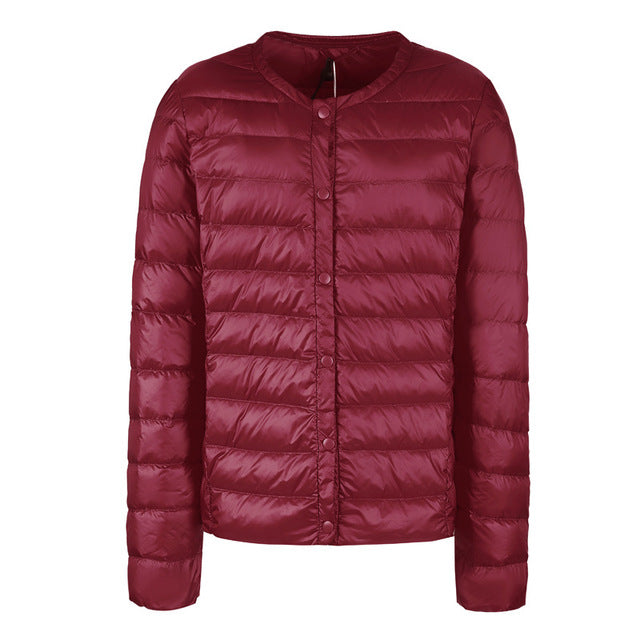 Drune | Elegance Essential" kragenlose kompakte Daunenjacke