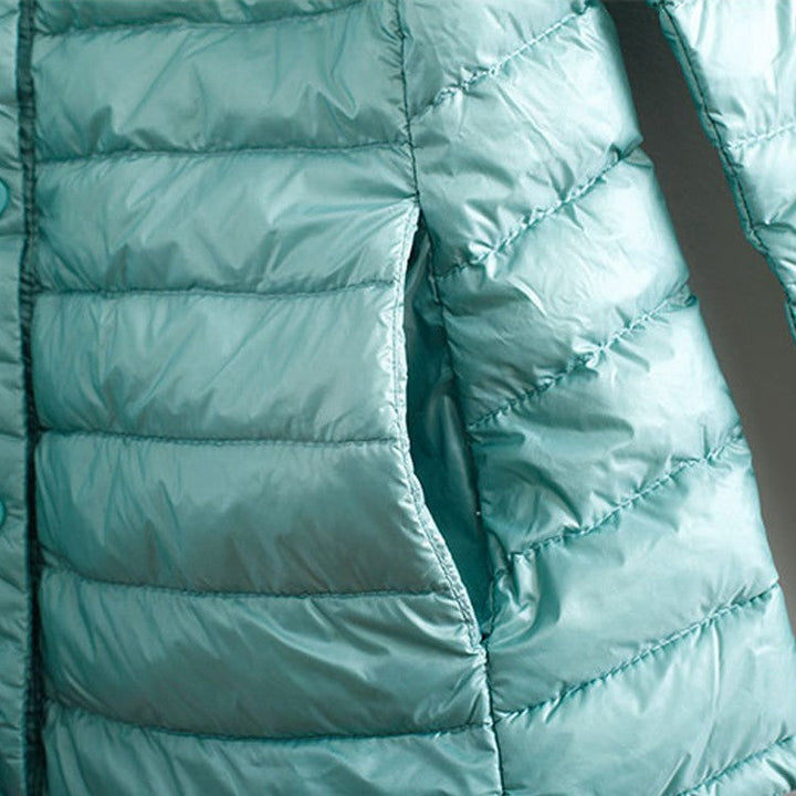 Drune | Elegance Essential" kragenlose kompakte Daunenjacke