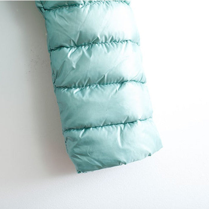 Drune | Elegance Essential" kragenlose kompakte Daunenjacke