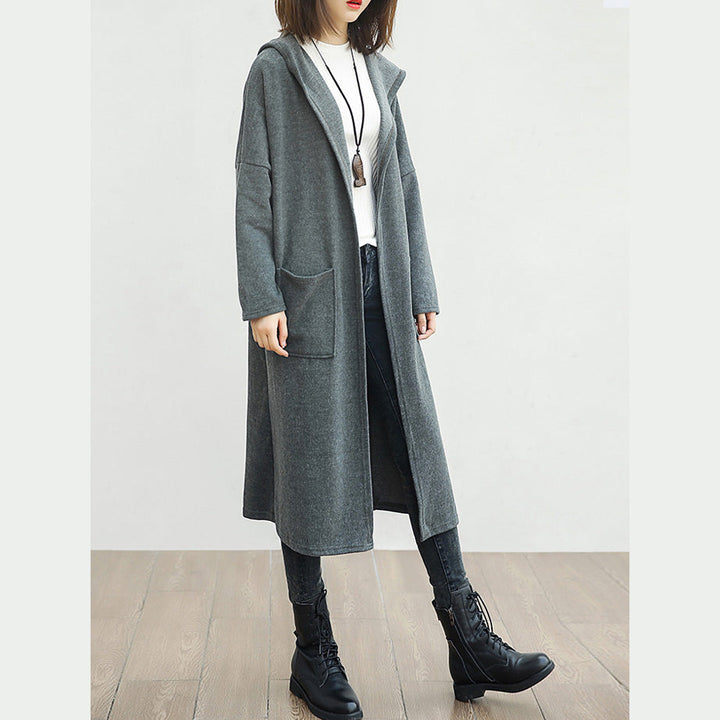 Drune | schwarze Wolloutwear übergroße große Taschen lange Mäntel mit Kapuze