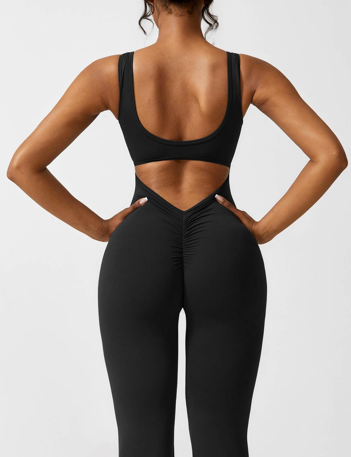 Drune | V-Rücken Auslaufender Jumpsuit