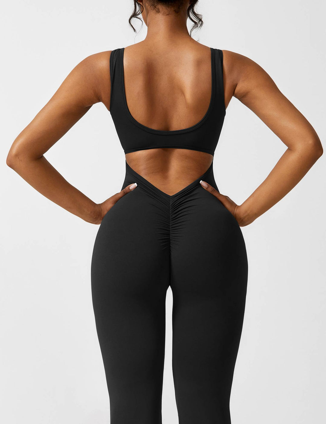 Drune | V-Rücken Auslaufender Jumpsuit