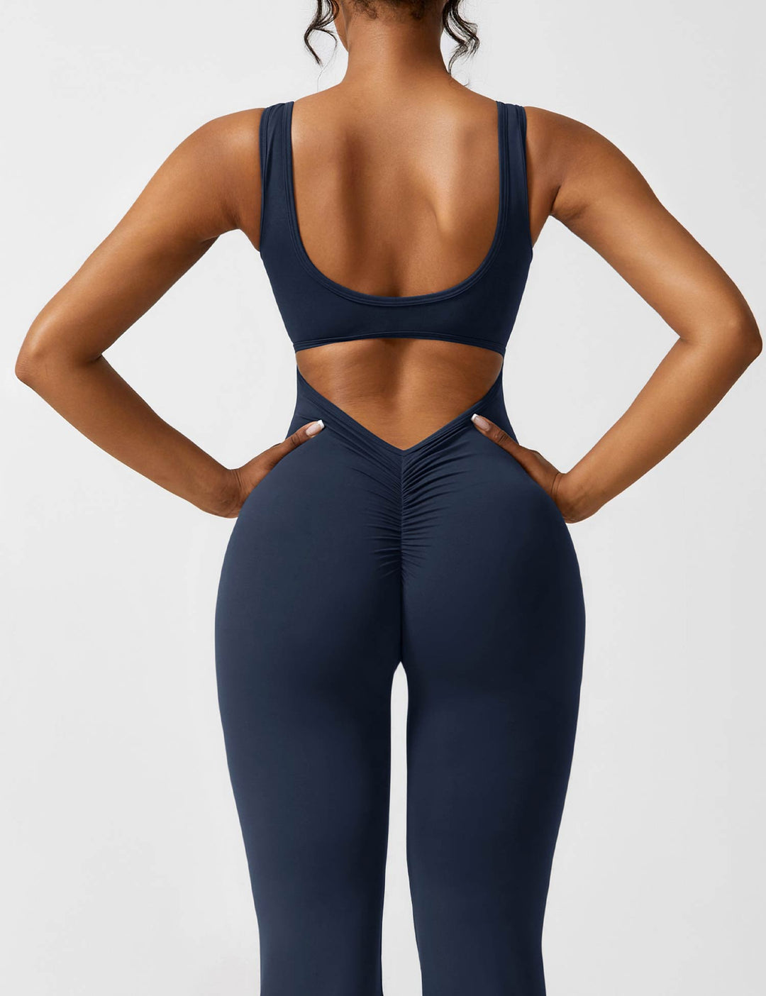 Drune | V-Rücken Auslaufender Jumpsuit