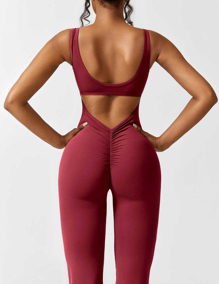 Drune | V-Rücken Auslaufender Jumpsuit